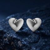 PLEATED HEART STUD EARRINGS