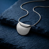 CONTOUR FOLDED CRESCENT PENDANT NECKLACE