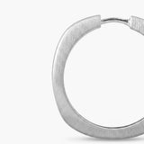 NODAL HOOP EARRINGS