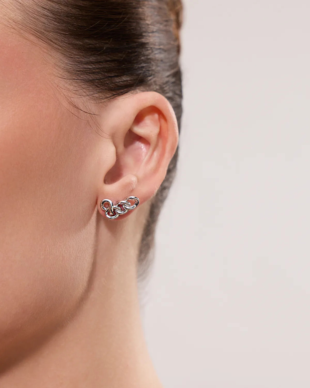NEXUS INTERLINKED STUD EARRINGS