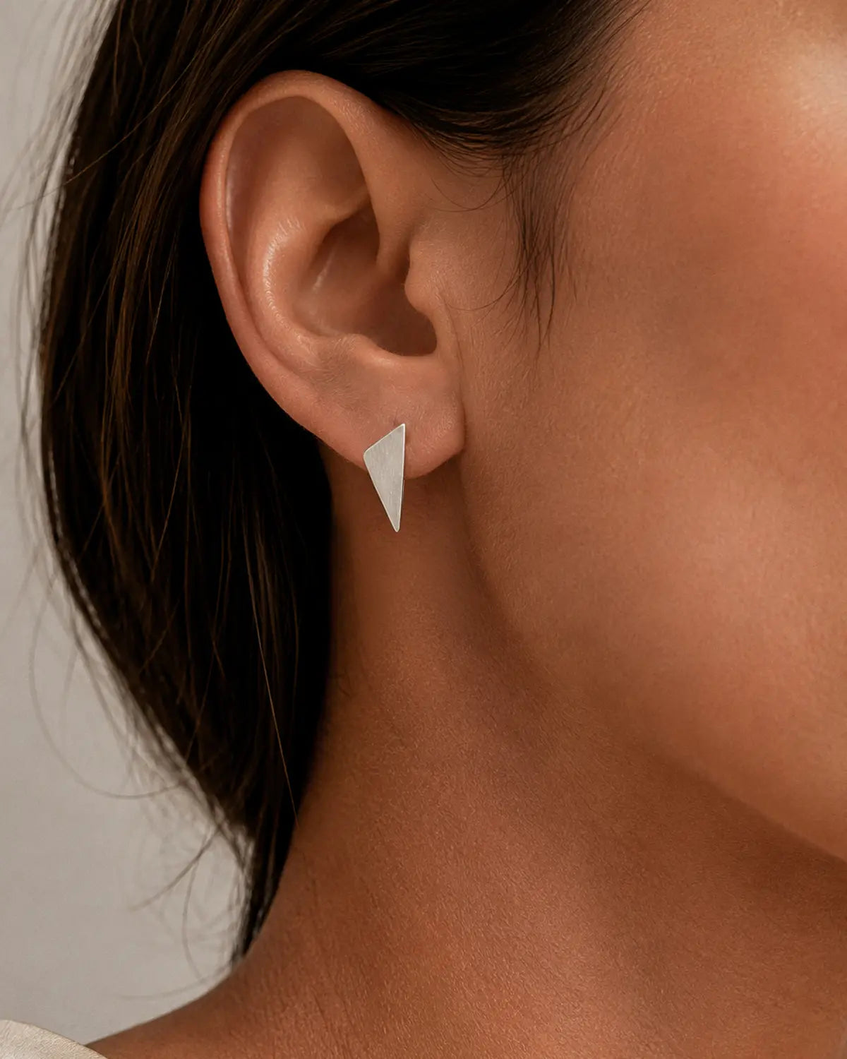 FLIPPED ANGULAR STUD EARRINGS