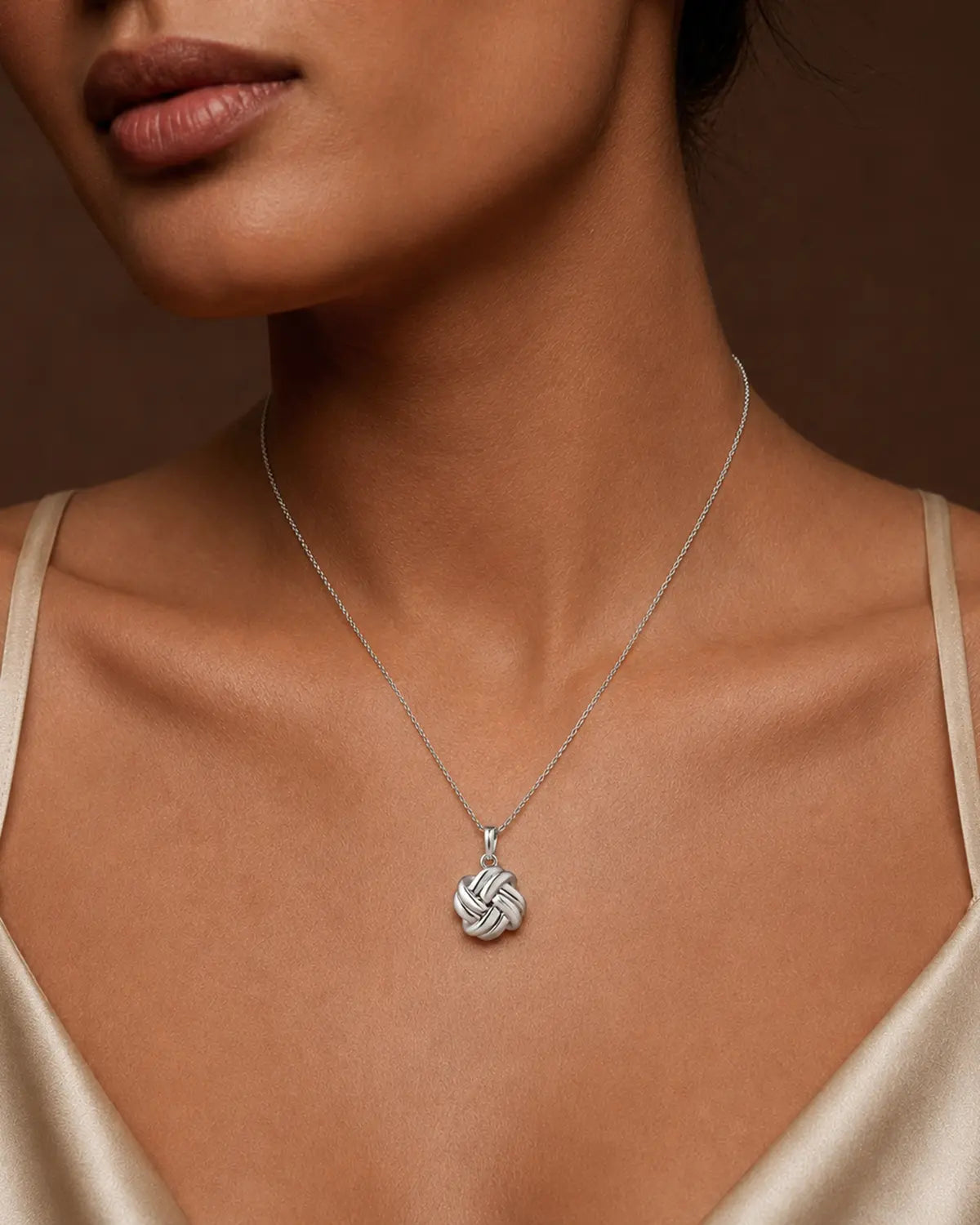 KNIT WOVEN KNOT PENDANT